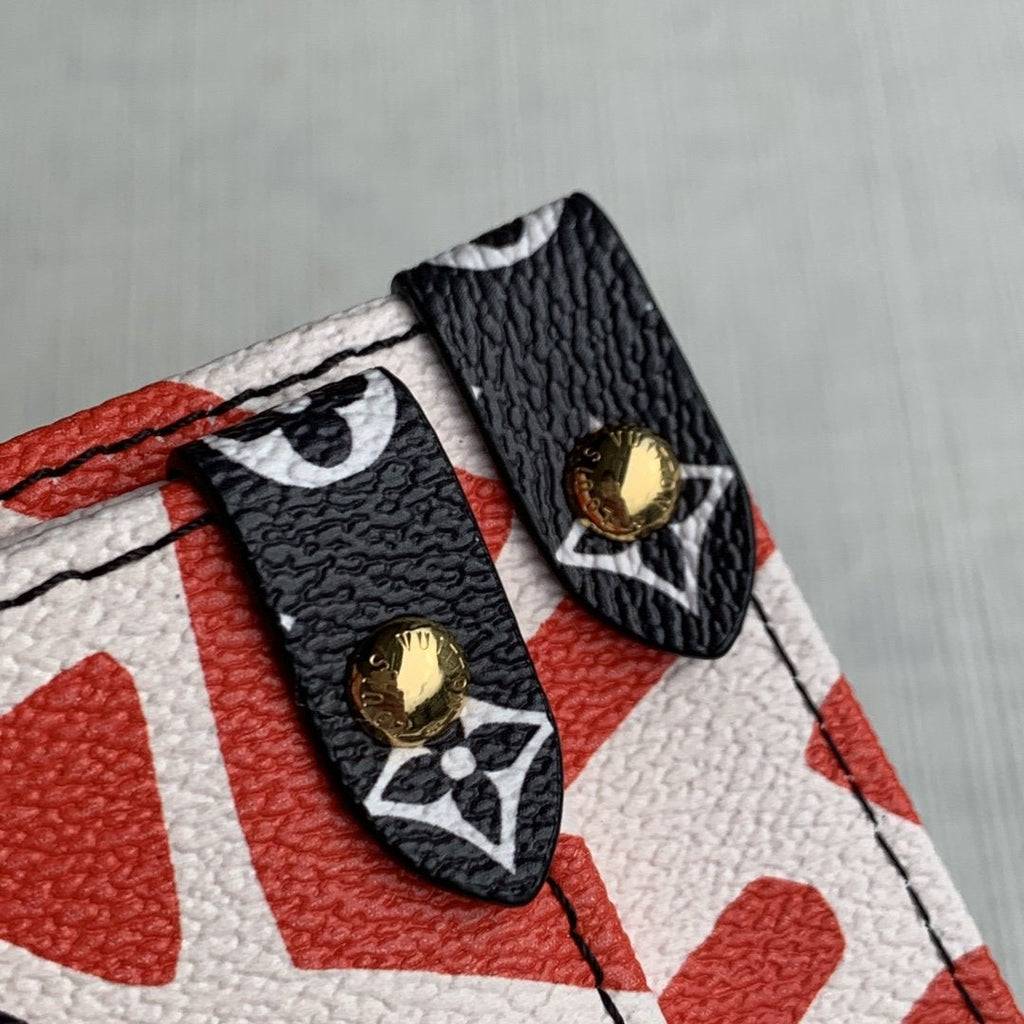 LV CRAFTY ONTHEGO GM CRÈME ET MONOGRAMME ROUGE TOILE GÉANTE