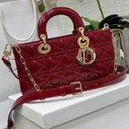 SAC D-JOY 26 ROUGE EN CUIR DE VEAU VERNIS, MOYEU
