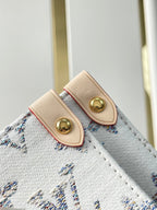 ONTHEGO MM 35 EN TISSU JACQUARD MONOGRAMME BLANC