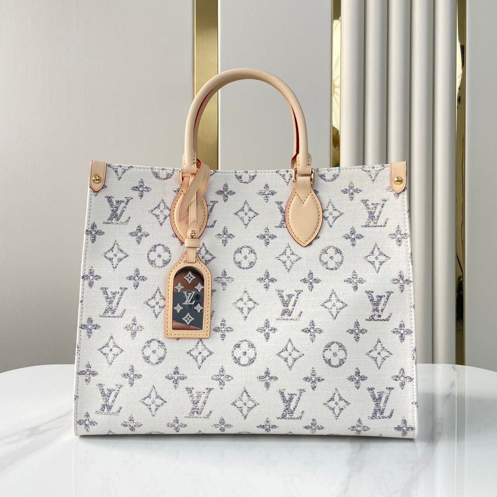ONTHEGO MM 35 EN TISSU JACQUARD MONOGRAMME BLANC