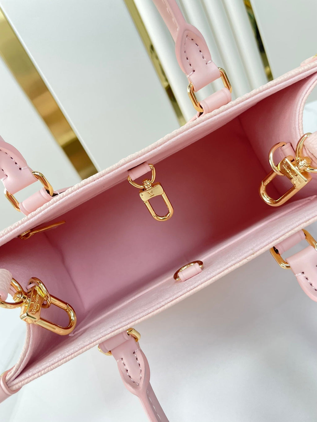 ONTHEGO PM 25 オパールピンクモノグラムエンプレインテレザー