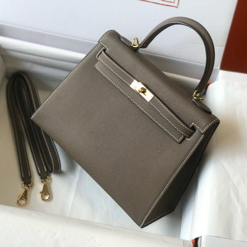 HM KELLY 25 ÉTOUPÉ CUIR EPSOM FERMOIR DORÉ
