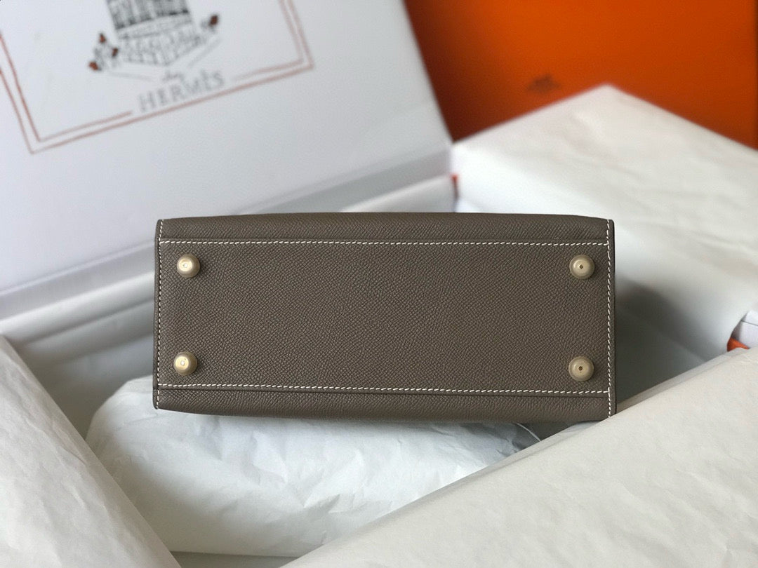 HM KELLY 25 ÉTOUPÉ CUIR EPSOM FERMOIR DORÉ