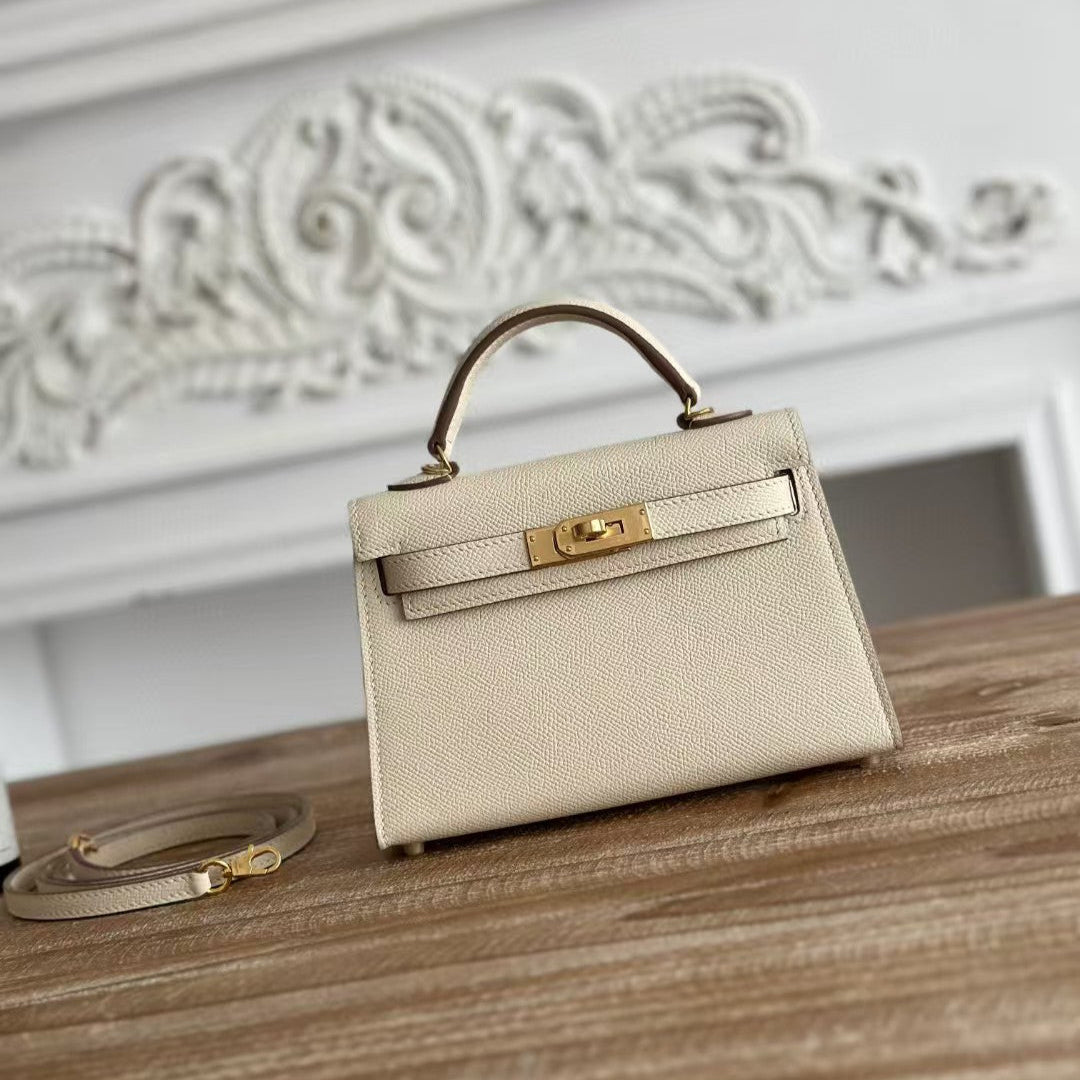 HM KELLY MINI 19 CUIR DE VEAU BLANC FERMOIR DORÉ