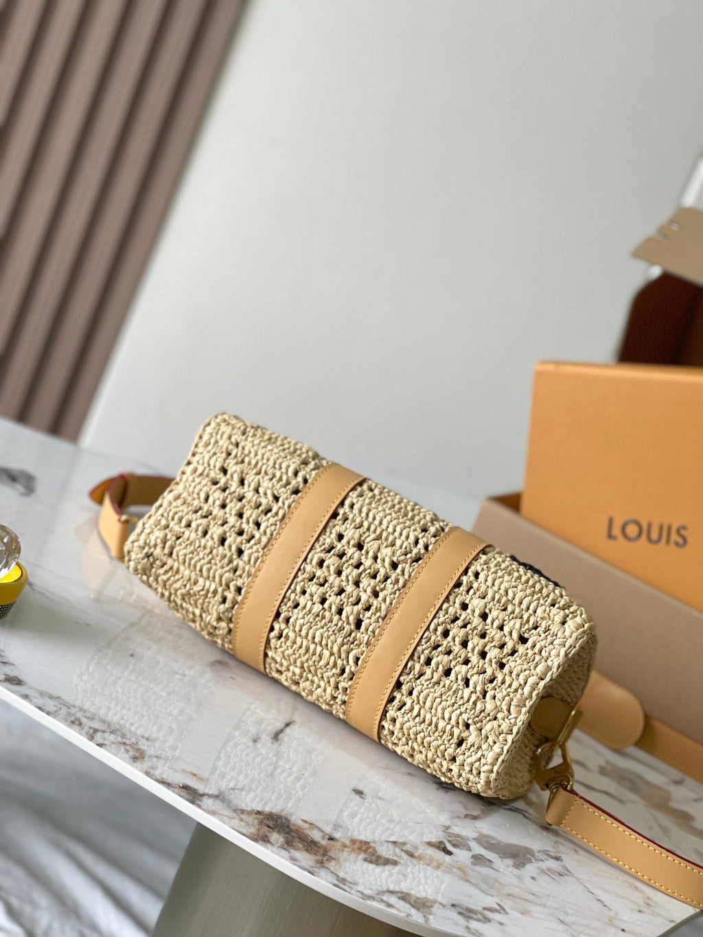 KEEPALL BANDOULIÈRE 25 EN RAFFIA CROCHÉ BEIGE ET GARNITURE EN CUIR DE VEAU