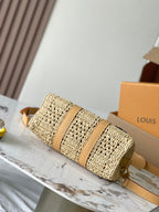 KEEPALL BANDOULIÈRE 25 EN RAFFIA CROCHÉ BEIGE ET GARNITURE EN CUIR DE VEAU