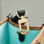 TOILE MONOGRAMME ONTHEGO PM 25 MARRON EN FORME DE CANARD